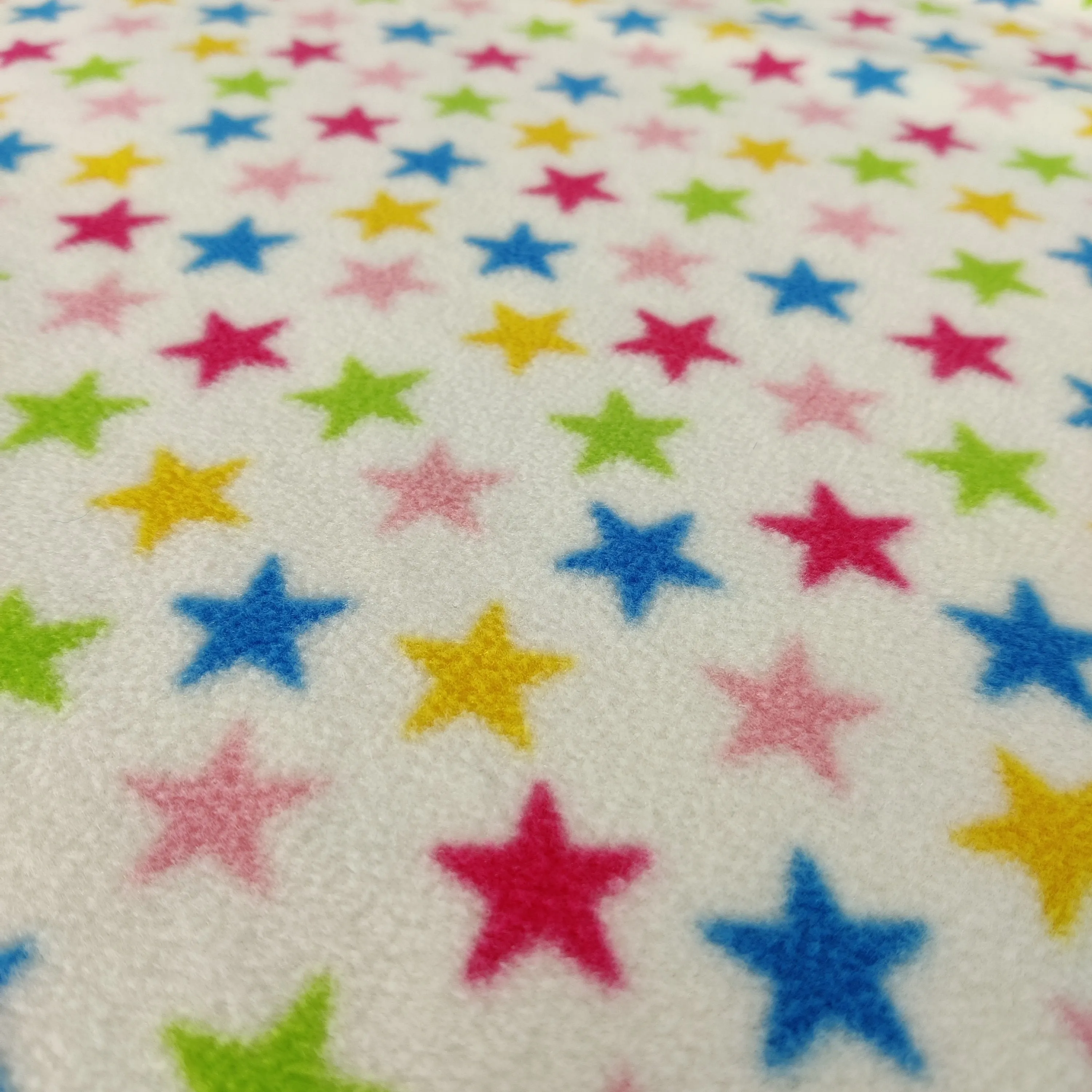 FS743_1 Multicolour Stars Fleece Fabric White